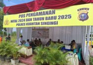 Kapolres Kuansing Dampingi Kadiskes Riau Tinjau Pos Pengamanan Nataru 2025 di Kuantan Mudik