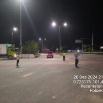 Pastikan Aman dan Lancar, Polsek Minas Lakukan Pengamanan dan Pengaturan Lalu Lintas di Exit Tol KM.28 Minas