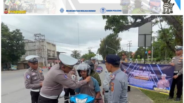 Satlantas Polres Kuantan Singingi Bersama Forum LLAJ Bagikan Helm Gratis dan Gencarkan Sosialisasi Keselamatan Berkendara pada Ops Zebra LK 2025